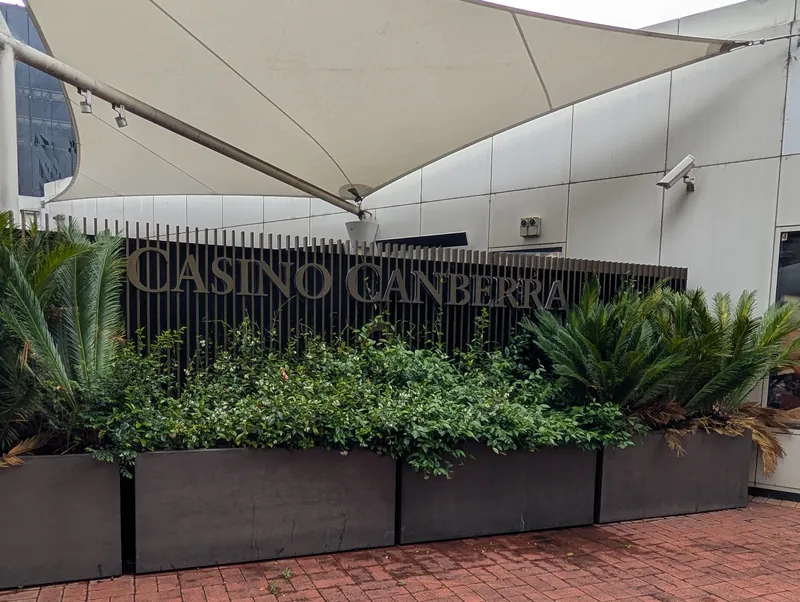Casino Canberra sign behind landscaped planters