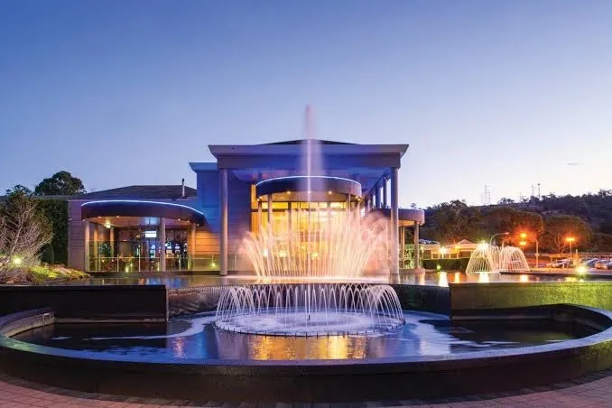 Country Club Casino entrance with illuminated fountain
