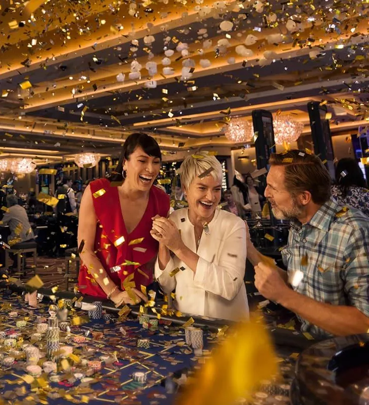 People playing at a casino table at Crown Perth in Australia