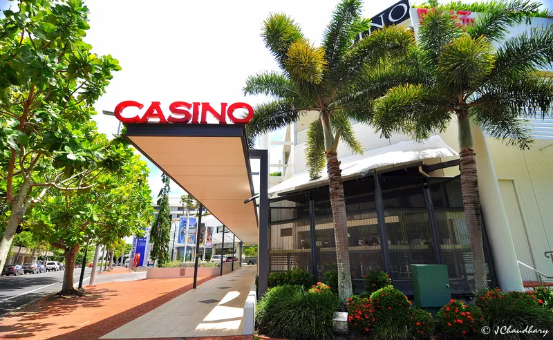 Palm-lined side entrance to The Reef Hotel Casino