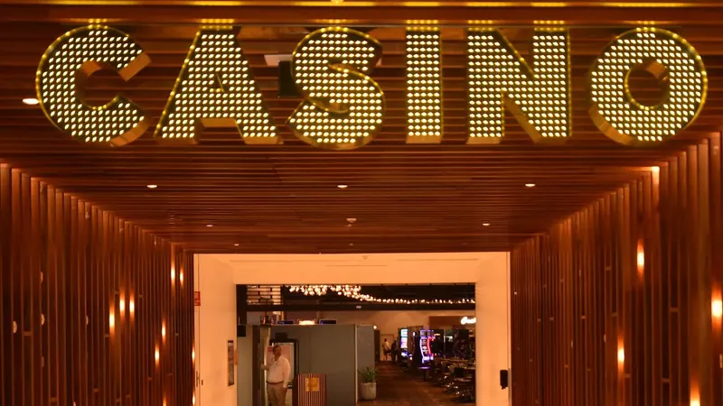 Illuminated casino entrance at The Ville Resort-Casino